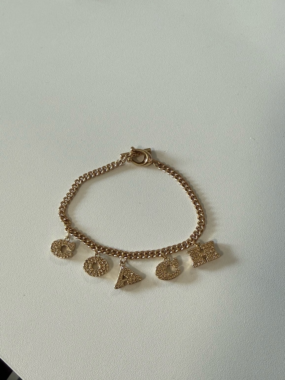 Coach Gold Charm Chain Bracelet